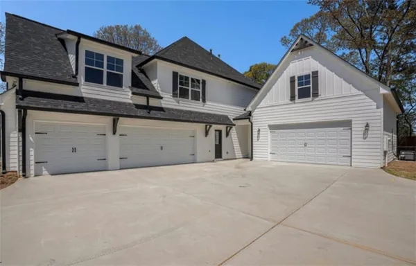 a view of a house with a garage
