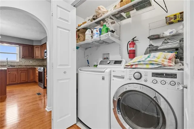 a utility room with dryer and washer
