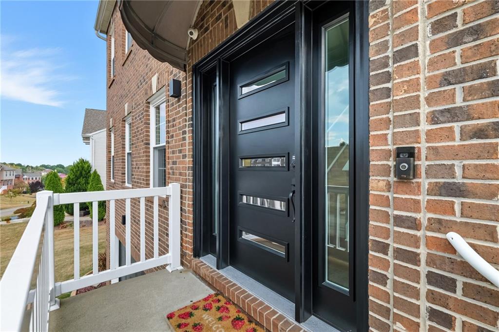 499 West Spring Grove Boulevard Rostraver Township, PA 15012 - Photo 2 of 46 a view of a balcony with a door