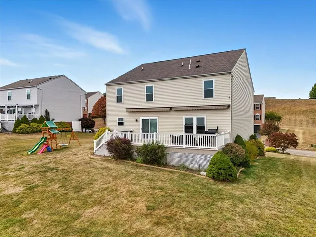 a view of residential houses with outdoor space