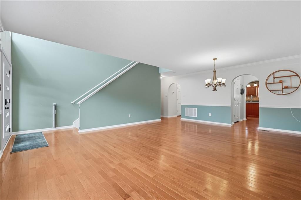 499 West Spring Grove Boulevard Rostraver Township, PA 15012 - Photo 5 of 46 a view of a livingroom with wooden floor