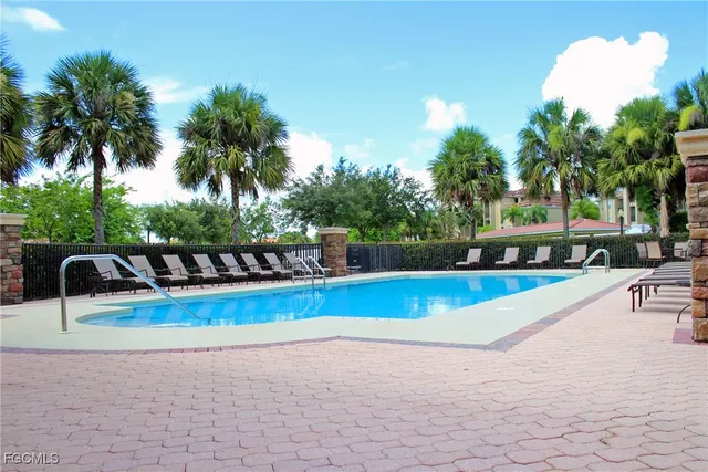 a view of a lake with a big yard