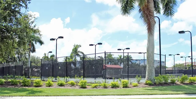 a view of swimming pool with outdoor seating