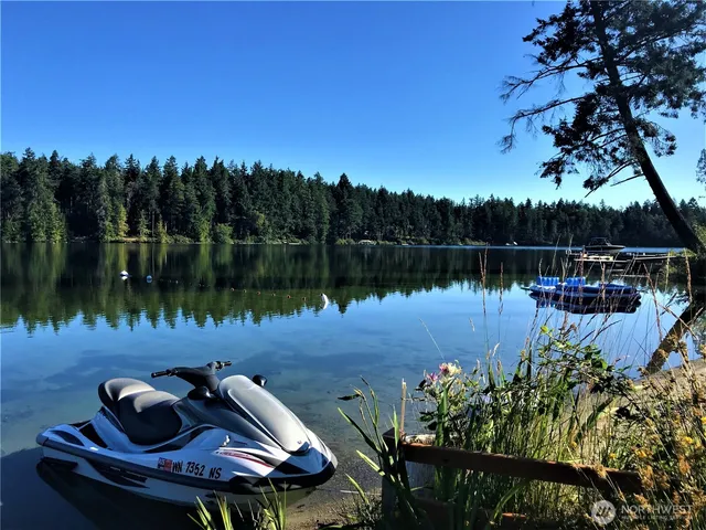 a lake view with a sitting space and lake view