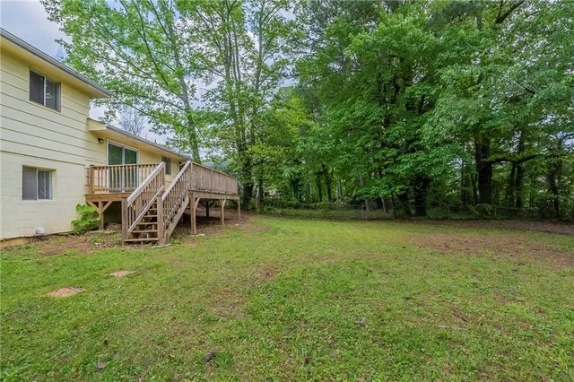 a view of a yard with a trees