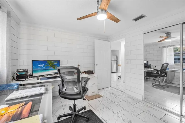 a view of swimming pool with a patio