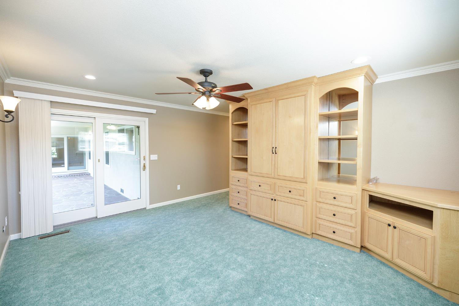 1001 Winsted Lane Modesto, CA 95355 - Photo 30 of 45 wooden floor with white walls and chandelier fan
