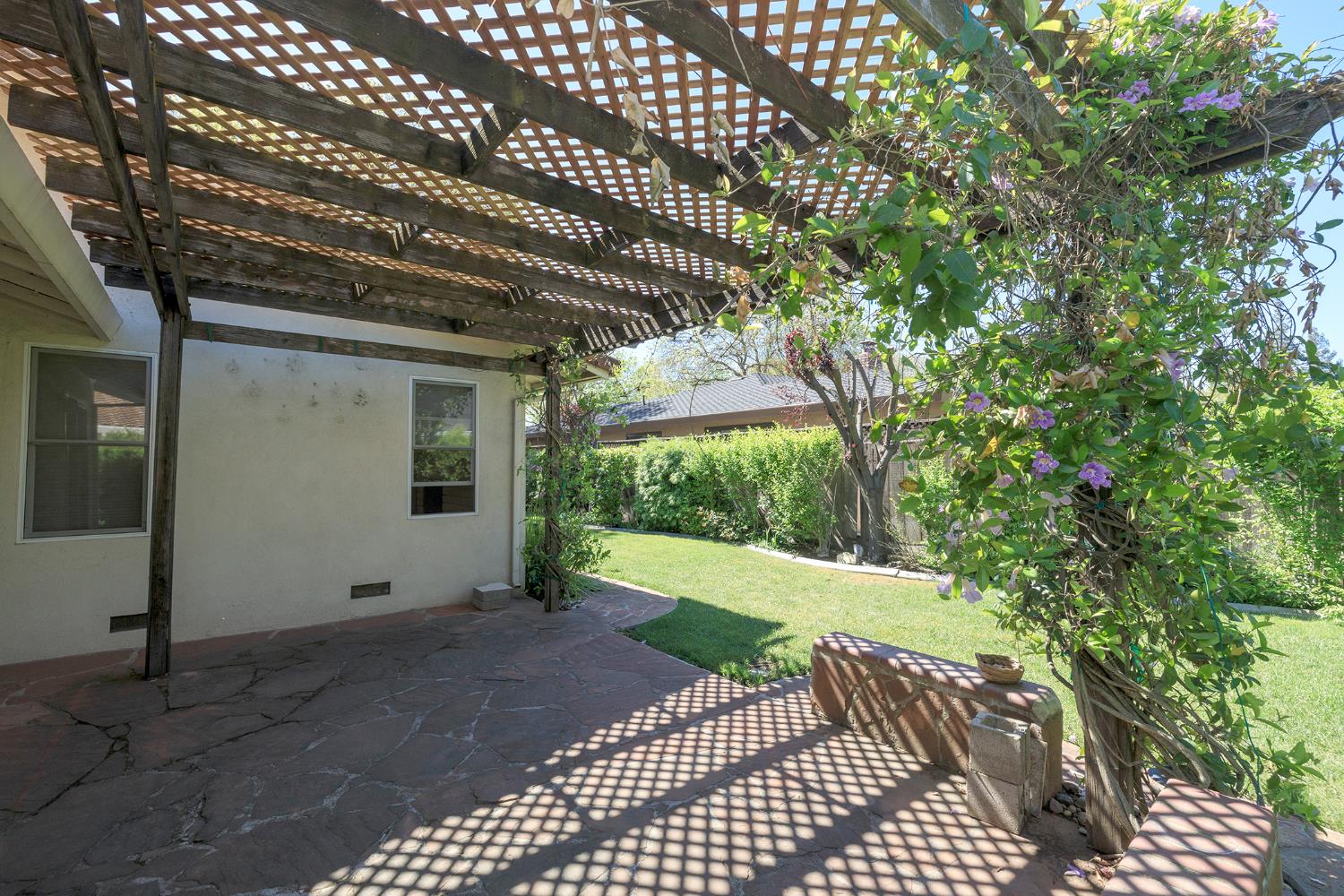 1001 Winsted Lane Modesto, CA 95355 - Photo 36 of 45 a view of a porch with a yard