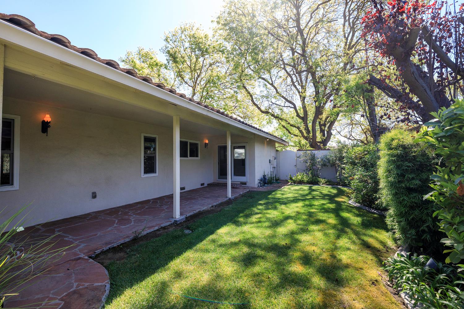 1001 Winsted Lane Modesto, CA 95355 - Photo 41 of 45 a backyard of a house with table and chairs