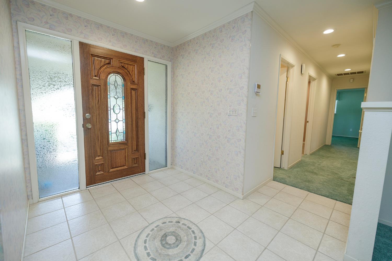 1001 Winsted Lane Modesto, CA 95355 - Photo 8 of 45 a view of livingroom with front door