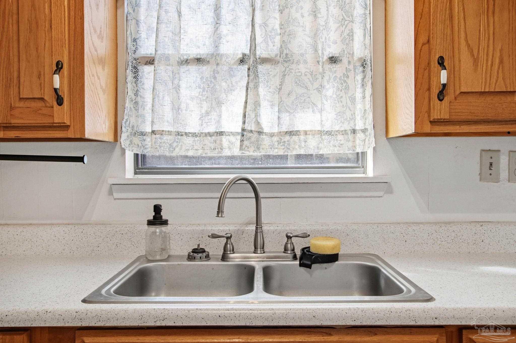 104 Thorndale Place Atmore, AL 36502 - Photo 14 of 39 a close view of sink and tap