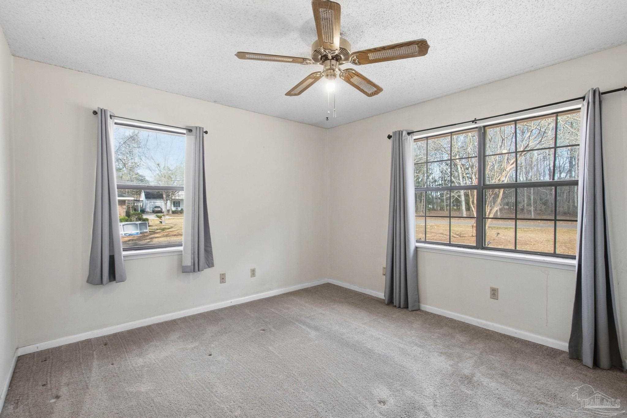 104 Thorndale Place Atmore, AL 36502 - Photo 17 of 39 a view of an empty room with a window