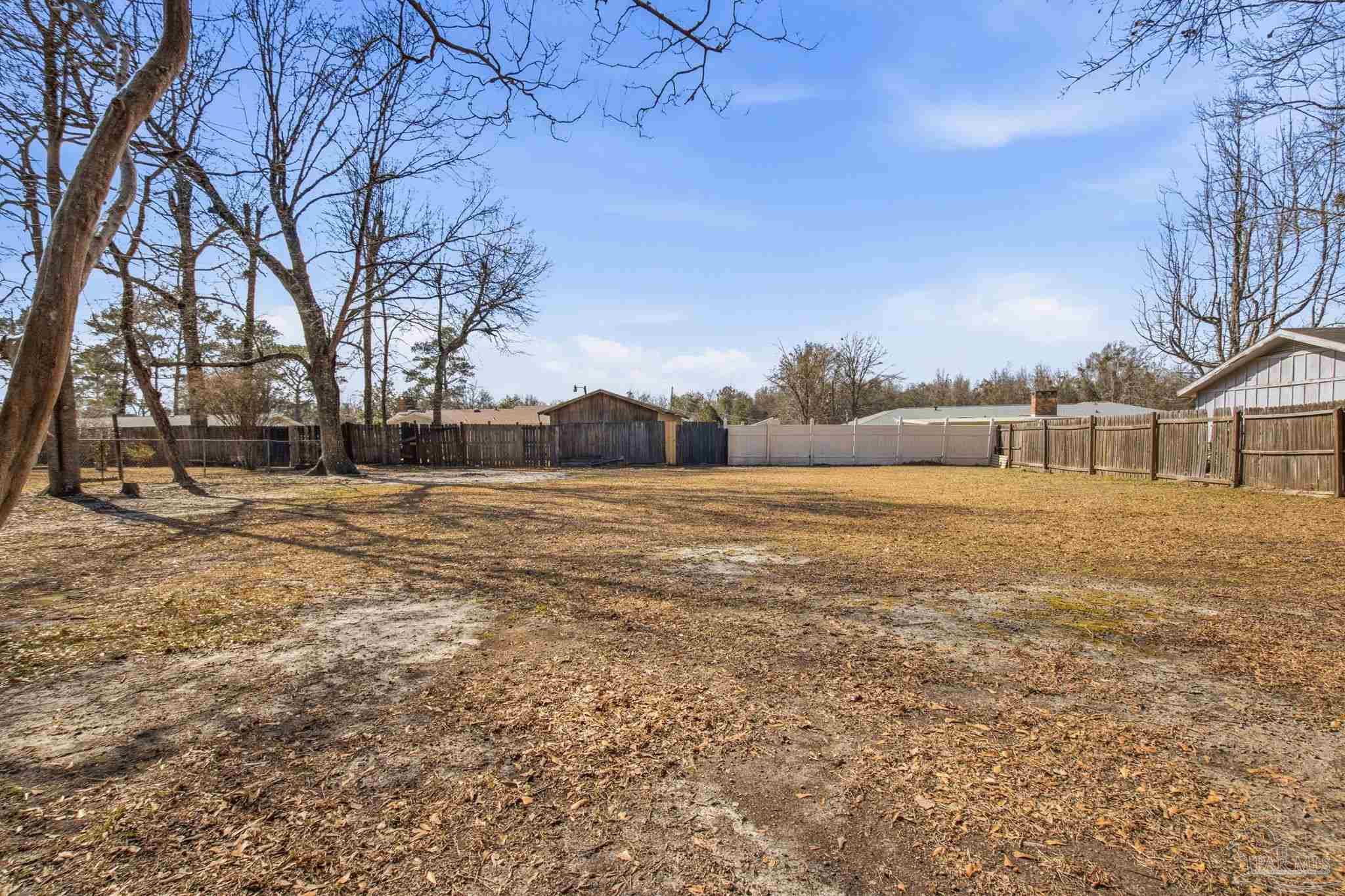 104 Thorndale Place Atmore, AL 36502 - Photo 37 of 39 a house with yard in front of it