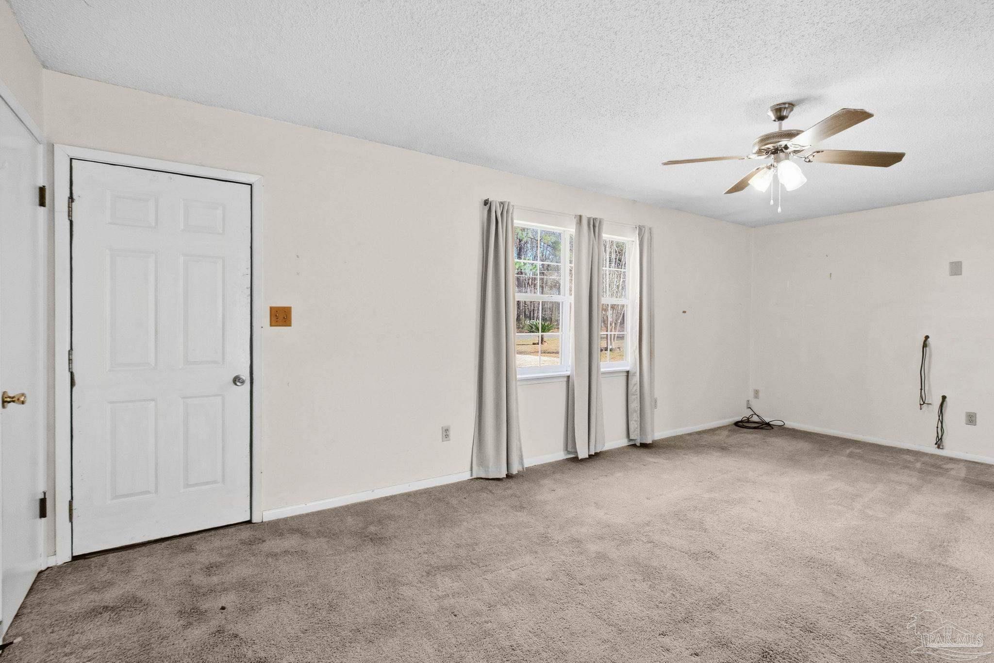 104 Thorndale Place Atmore, AL 36502 - Photo 6 of 39 wooden floor in an empty room