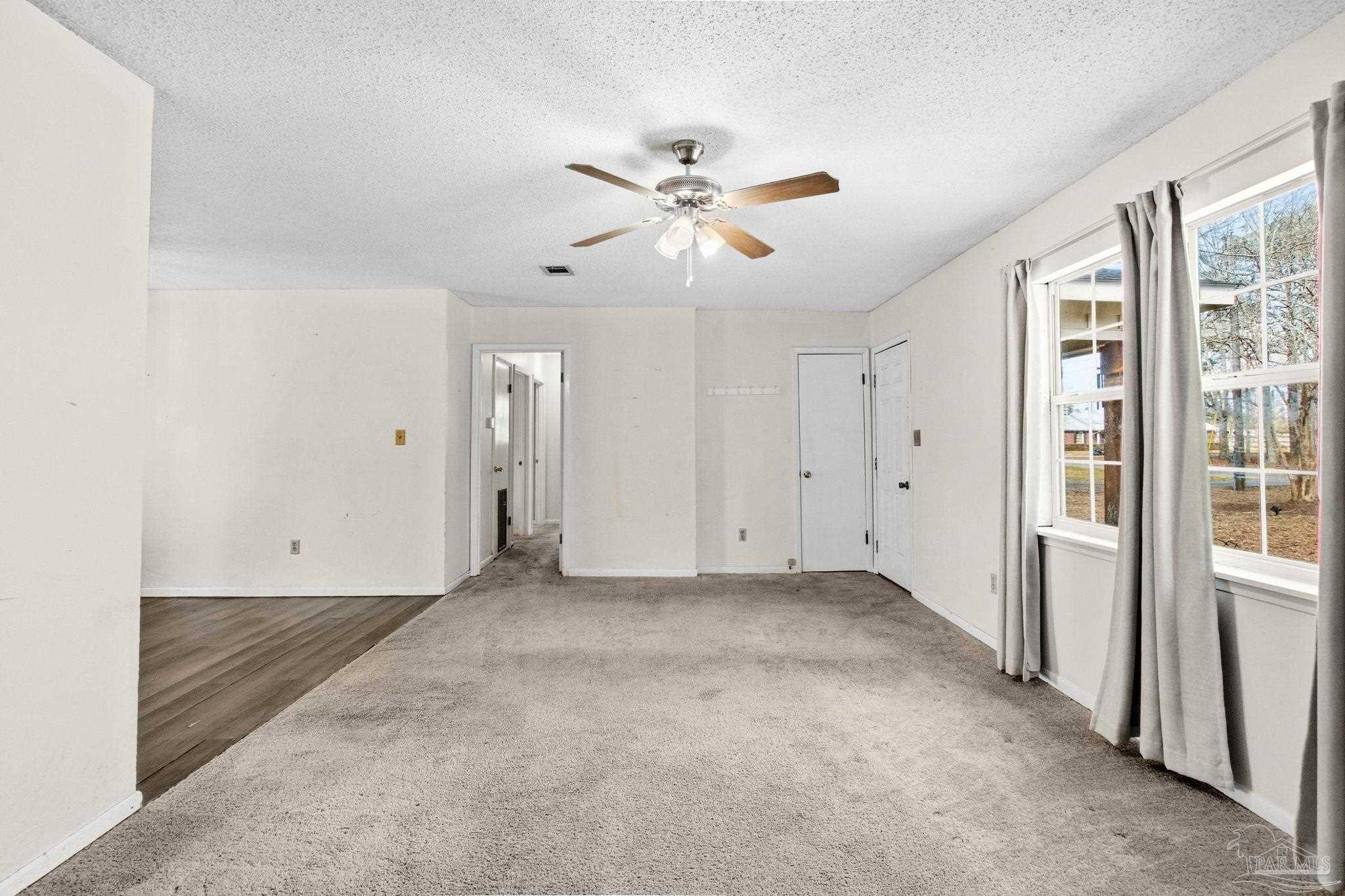 104 Thorndale Place Atmore, AL 36502 - Photo 7 of 39 wooden floor in an empty room