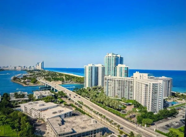 a view of a city with tall buildings