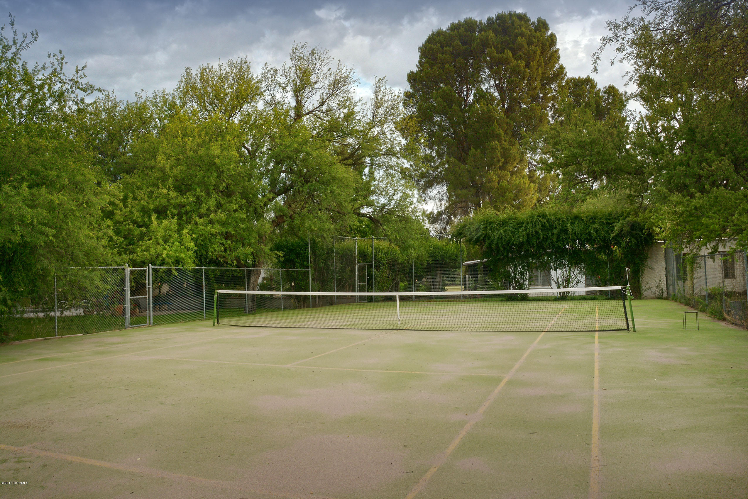 87 Clark Crossing Road Rio Rico, AZ 85648 - Photo 37 of 51 a view of a tennis court