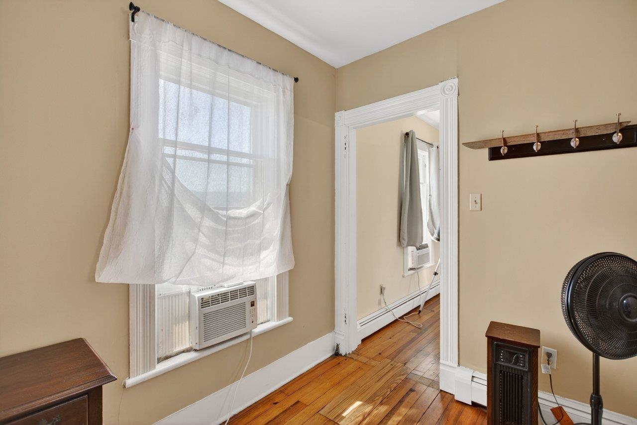 420 West Spring Street Woodstock, VA 22664 - Photo 45 of 67 a room with a table and a window