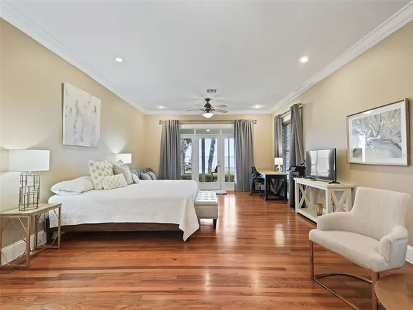 a front view of a house with swimming pool having outdoor seating