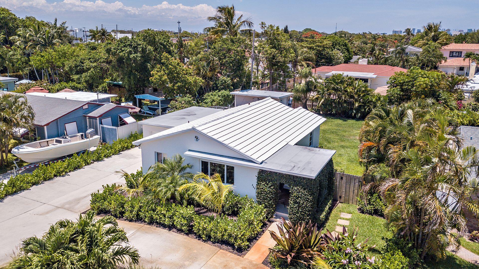 359 Ellamar Road West Palm Beach, FL 33405 - Photo 12 of 28 an aerial view of a house with a yard and mountain