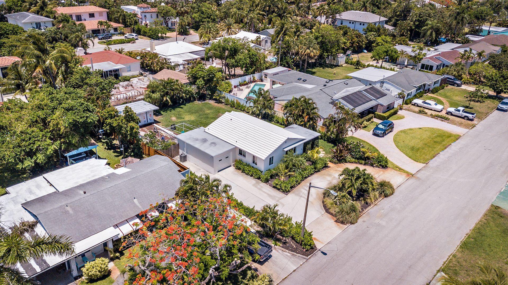 359 Ellamar Road West Palm Beach, FL 33405 - Photo 19 of 28 an aerial view of a house with a yard