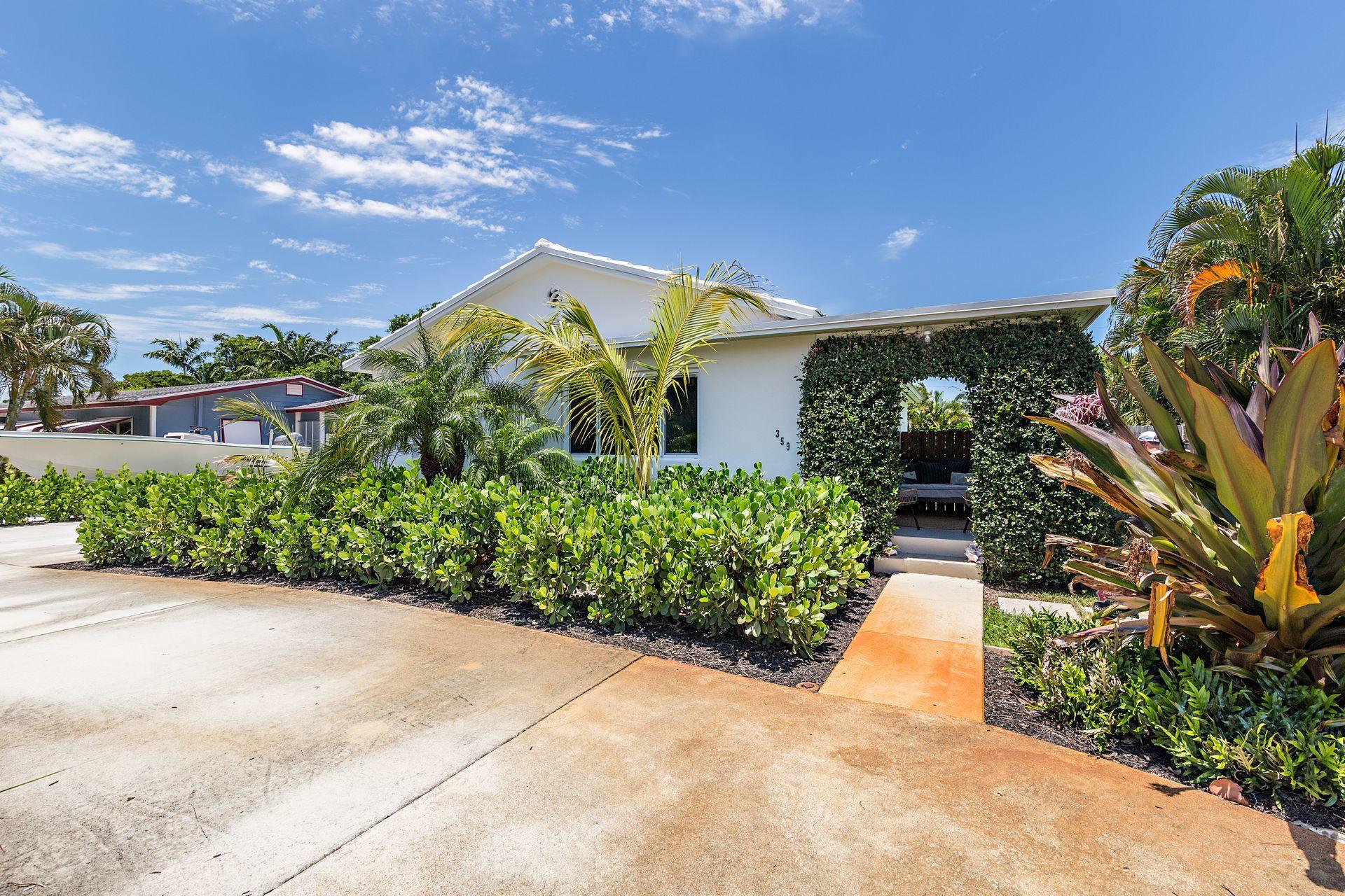 359 Ellamar Road West Palm Beach, FL 33405 - Photo 22 of 28 a view of a garden with pathway