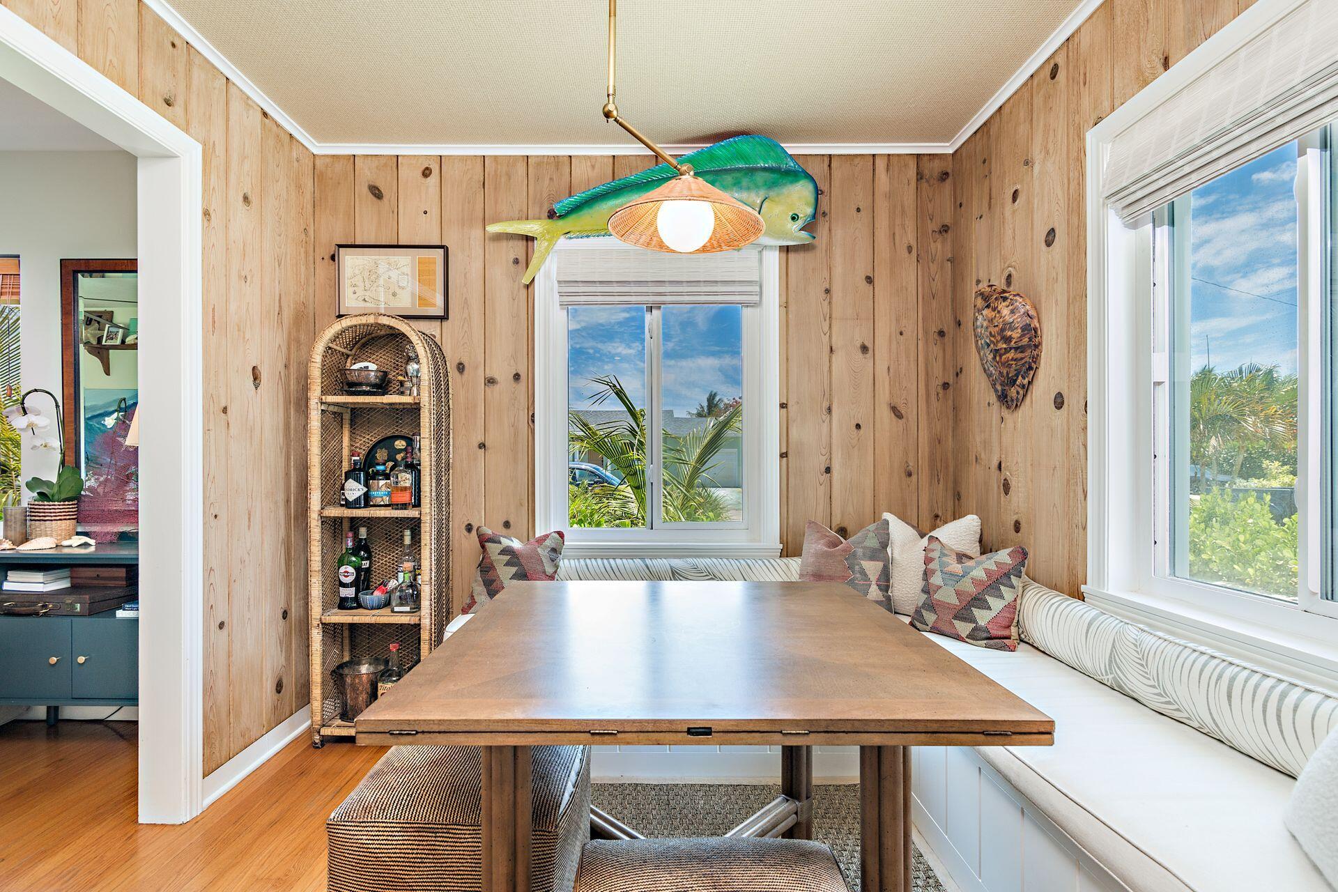 359 Ellamar Road West Palm Beach, FL 33405 - Photo 4 of 28 a view of a dining room with furniture and a window