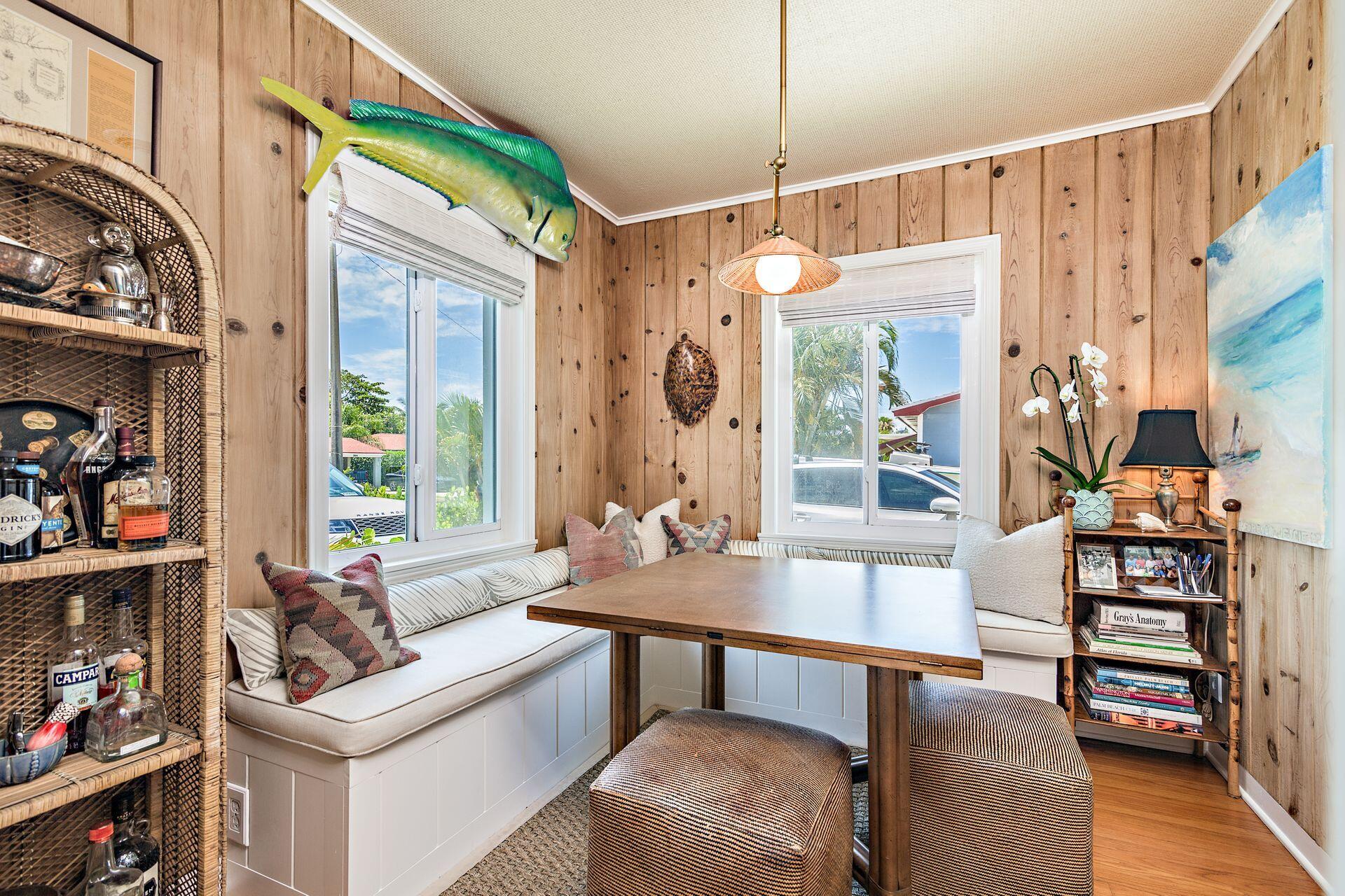 359 Ellamar Road West Palm Beach, FL 33405 - Photo 5 of 28 a living room with furniture a fireplace and a window