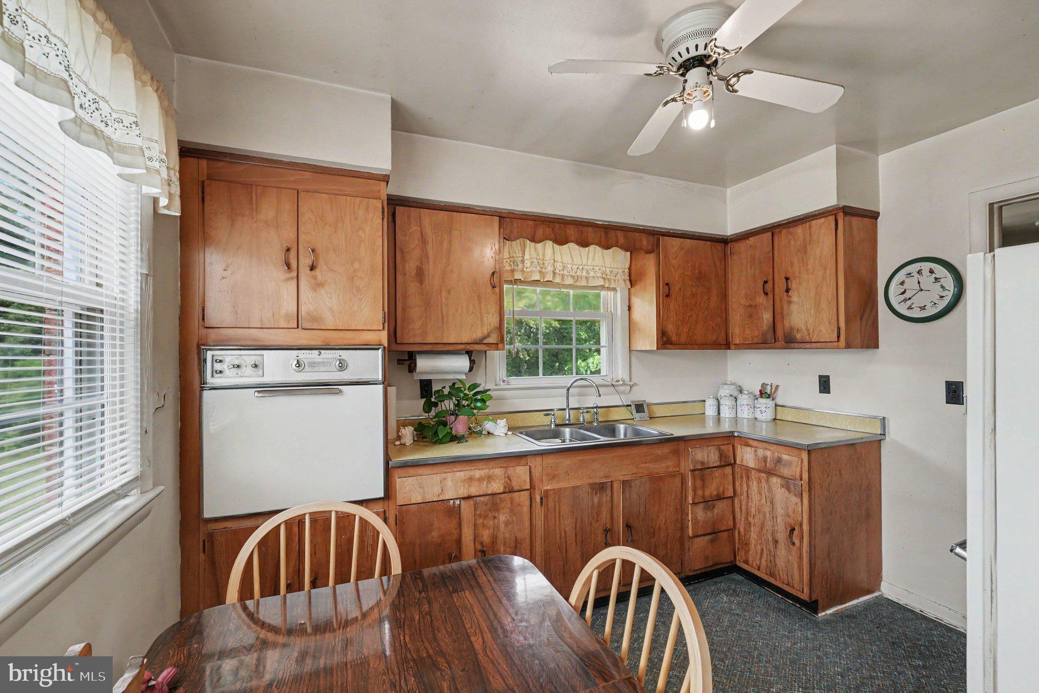 10218 Indiantown Road King George, VA 22485 - Photo 10 of 28 Cozy kitchen with classic wood cabinetry.