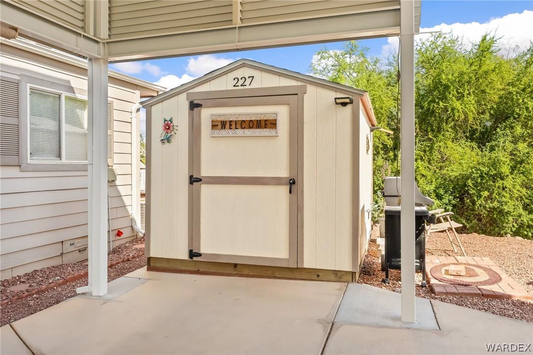 2000 Ramar Road, Unit 227 Bullhead City, AZ 86442 - Photo 12 of 40 Private rear setup with storage shed and patio space?perfect extension of your RV lifestyle.