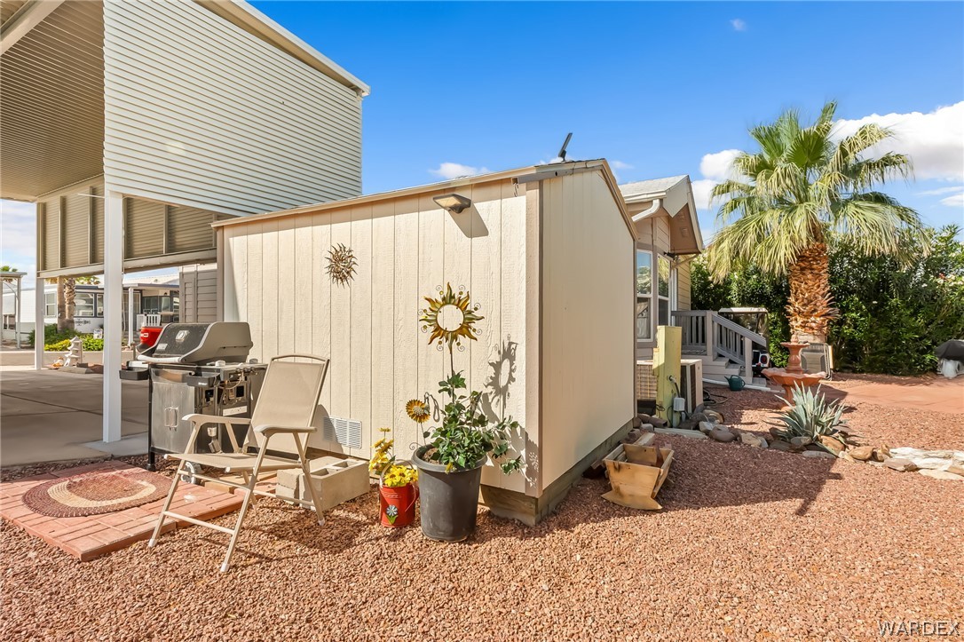2000 Ramar Road, Unit 227 Bullhead City, AZ 86442 - Photo 14 of 40 Outdoor hangout area with BBQ space and storage? perfect for easy, low-maintenance living.