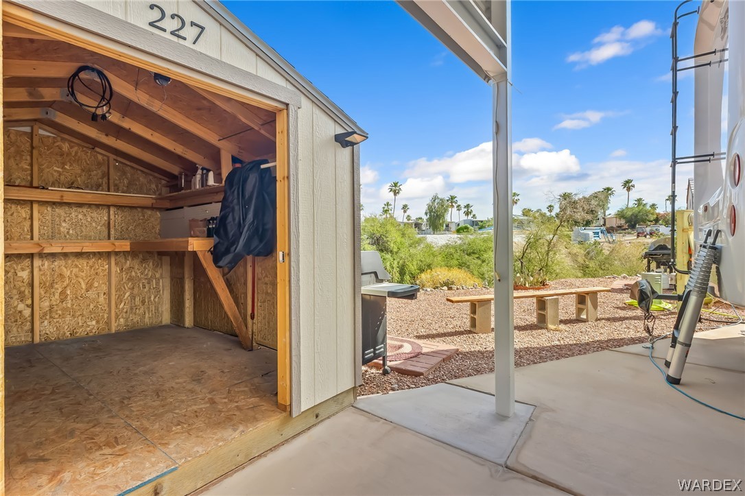 2000 Ramar Road, Unit 227 Bullhead City, AZ 86442 - Photo 18 of 40 Seamless indoor-outdoor flow from the shed to the RV area? everything right where you need it.