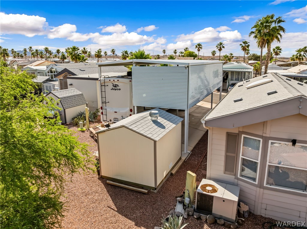 2000 Ramar Road, Unit 227 Bullhead City, AZ 86442 - Photo 20 of 40 Side angle highlighting the oversized RV port and upgraded awning for maximum protection.