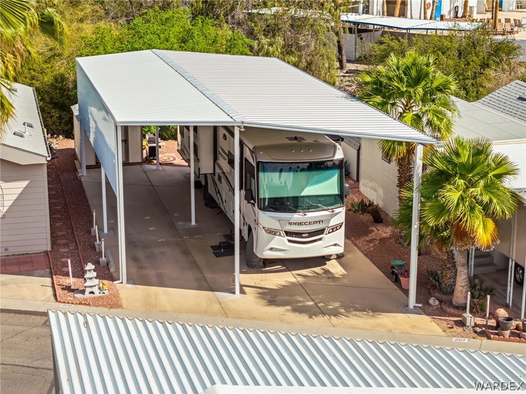 2000 Ramar Road, Unit 227 Bullhead City, AZ 86442 - Photo 8 of 40 Elevated angle of a wide RV port with a premium extended awning for full coverage and shade.