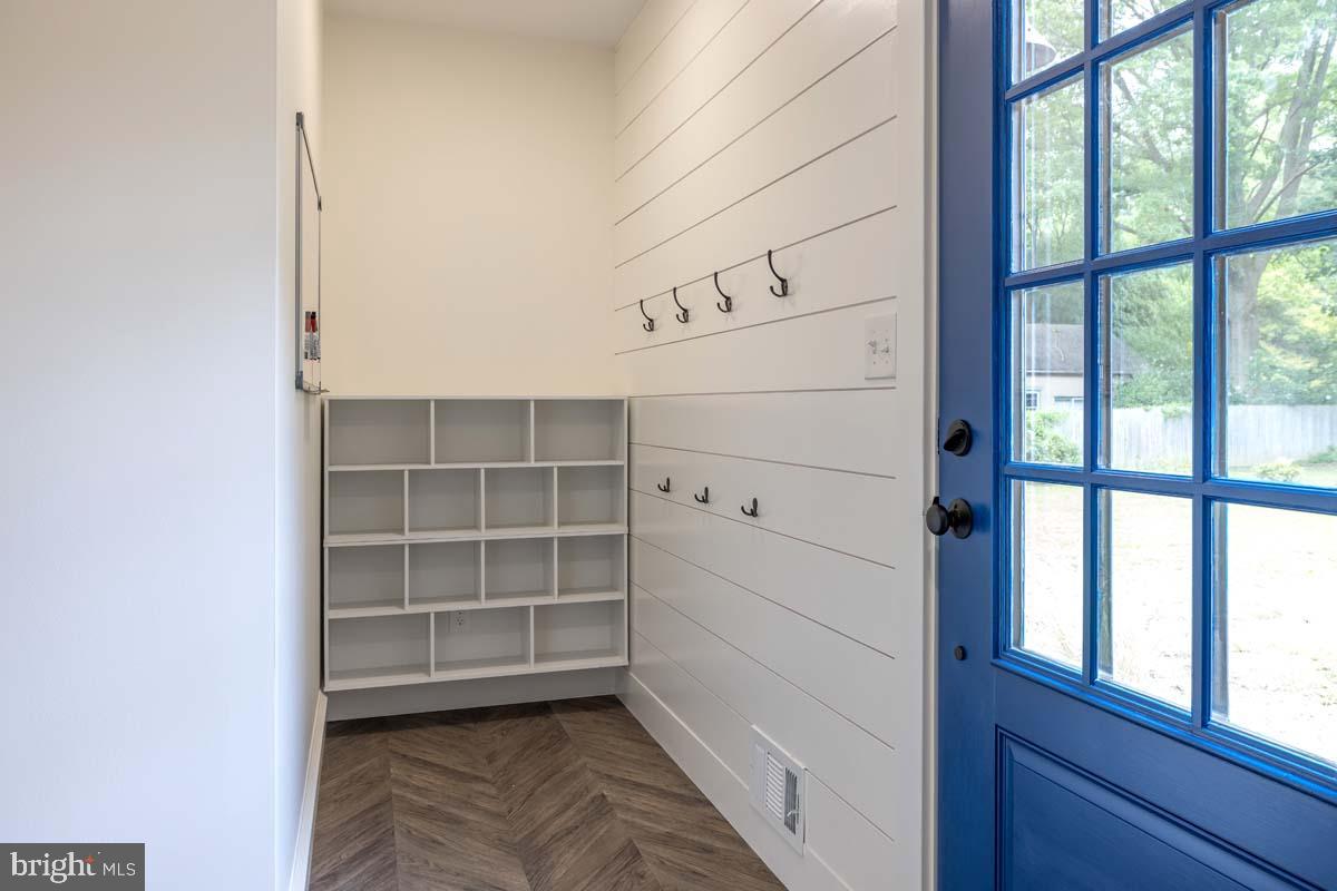 345 Park Avenue Swarthmore, PA 19081 - Photo 23 of 39 Mudroom with storage, coat hooks and white board