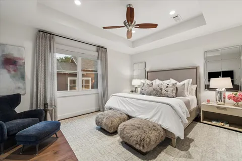 a bedroom with bed and a window