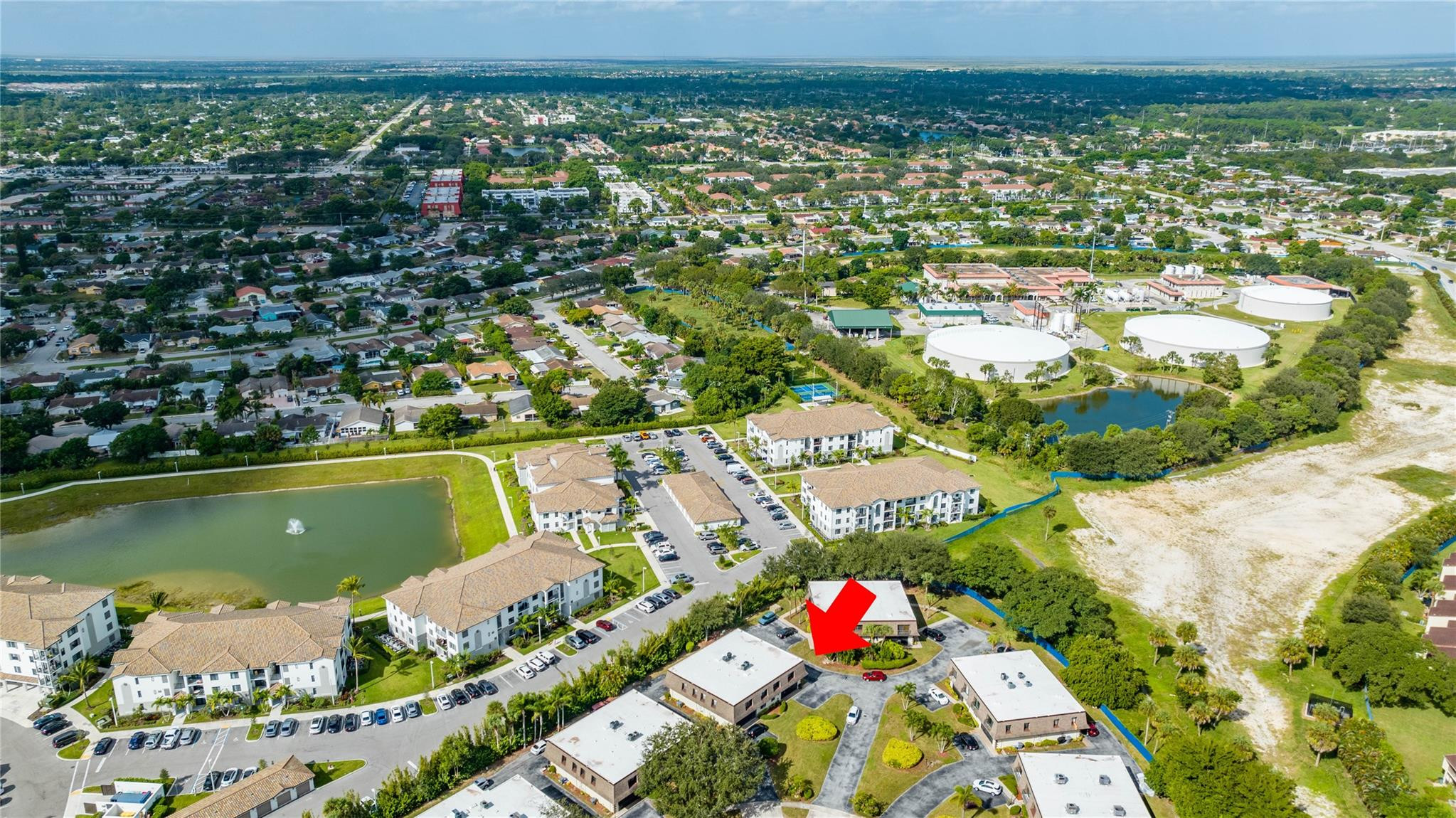 9430 Southwest 61st Way, Unit A Boca Raton, FL 33428 - Photo 29 of 32 an aerial view of residential houses with outdoor space