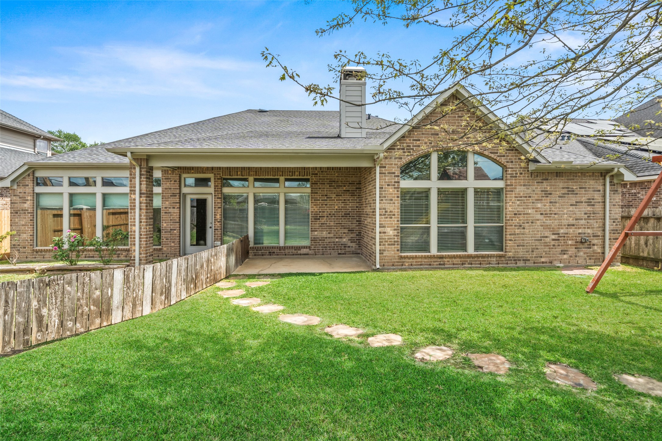 2818 Red Maple Drive Katy, TX 77494 - Photo 44 of 50 front view of a house with a yard