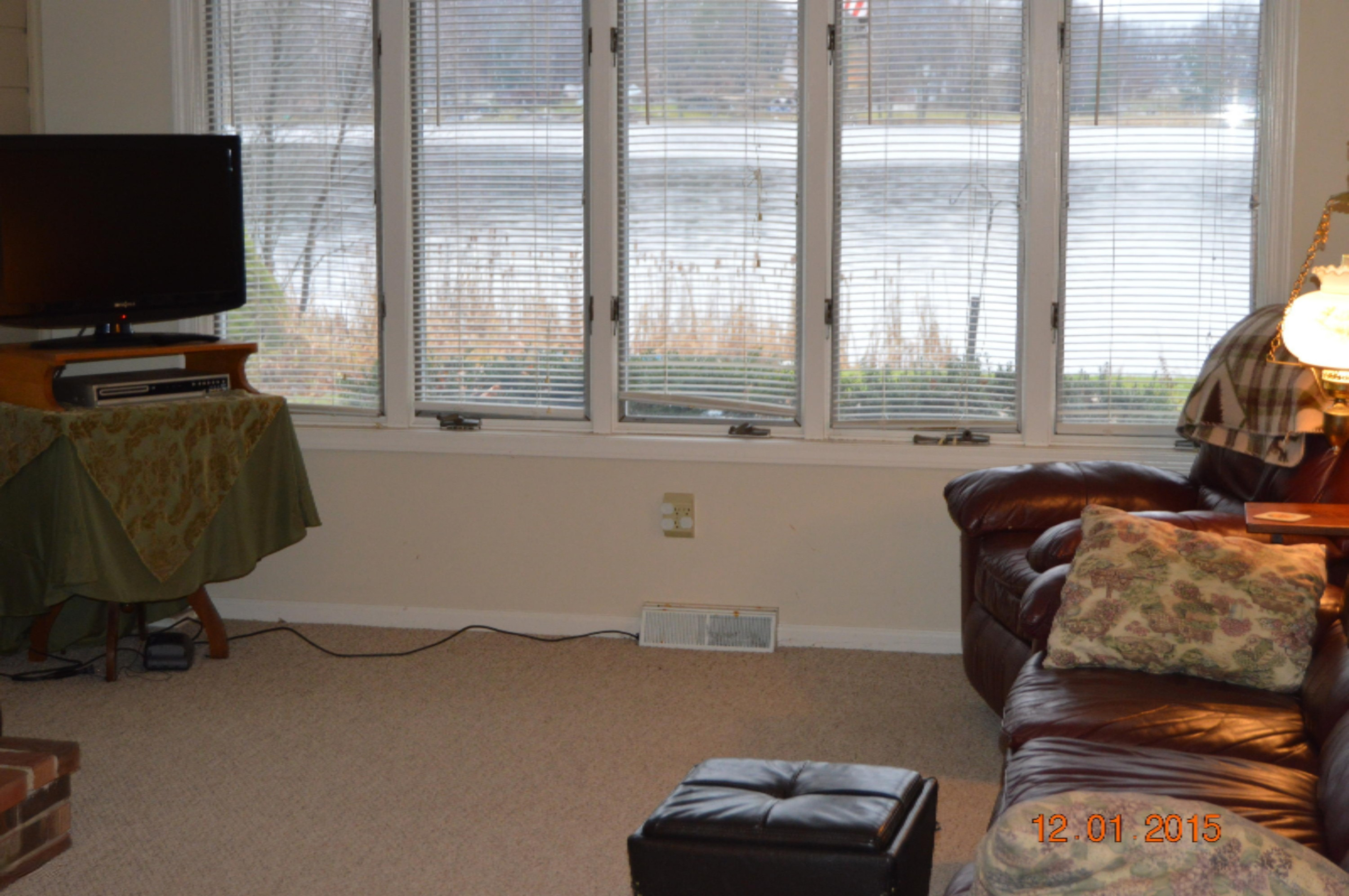 10957 Berridge Road Lakeview, MI 48850 - Photo 7 of 25 Lots of windows to enjoy the lake