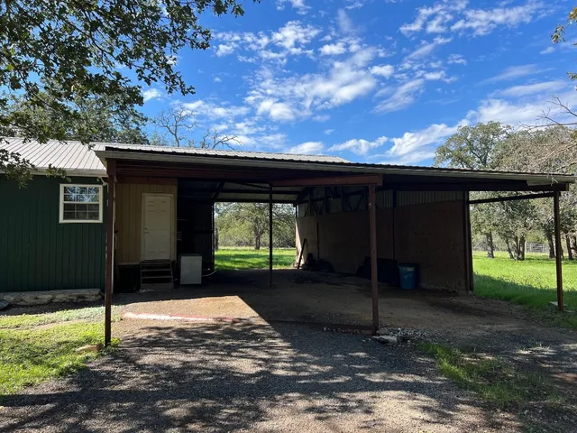 a backyard of a house with a yard