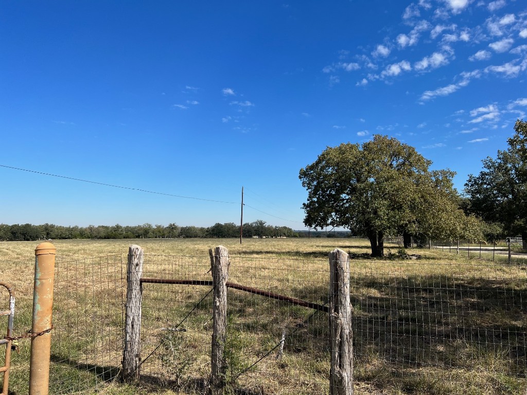 111 Chris Lane Florence, TX 76527 - Photo 22 of 24 a view of a lake with a yard