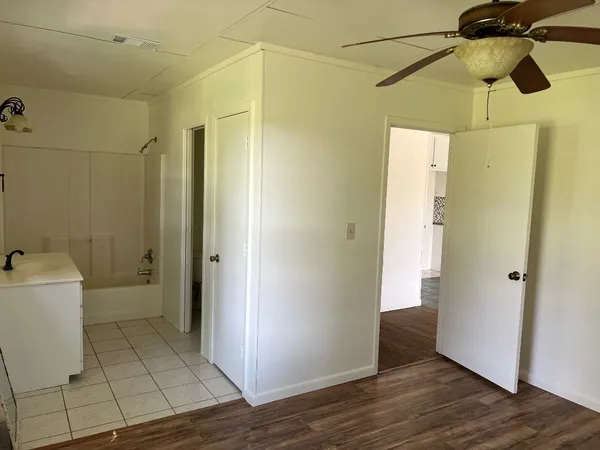 a bathroom with a shower and a toilet