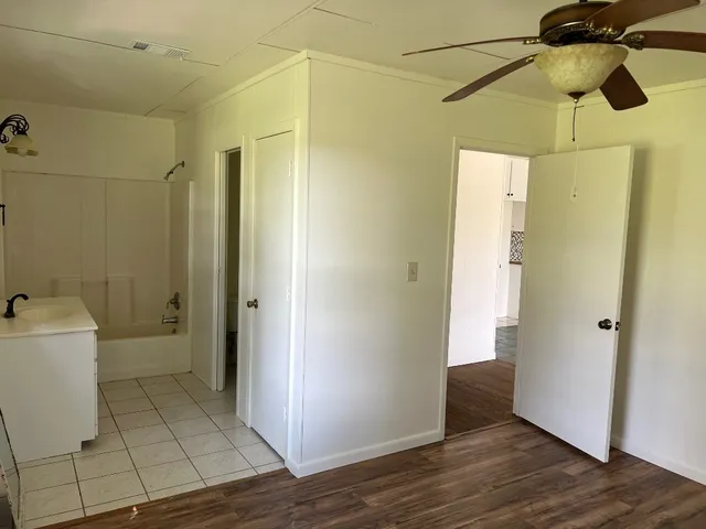 a bathroom with a shower and a toilet