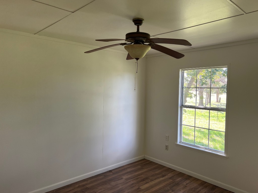 111 Chris Lane Florence, TX 76527 - Photo 6 of 24 a view of a room with a window and a ceiling fan