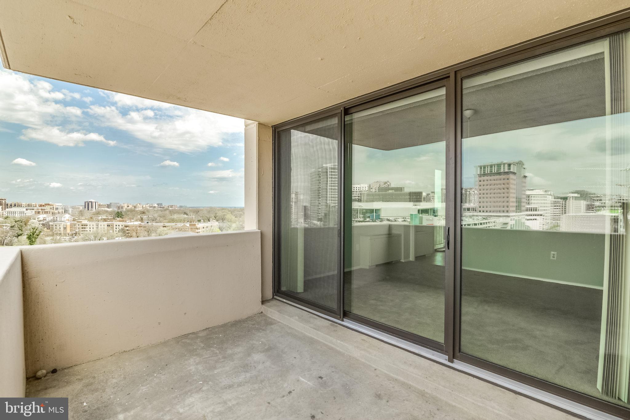 4141 North Henderson Road, Unit 1019 Arlington, VA 22203 - Photo 18 of 27 Spacious balcony with city skyline views.