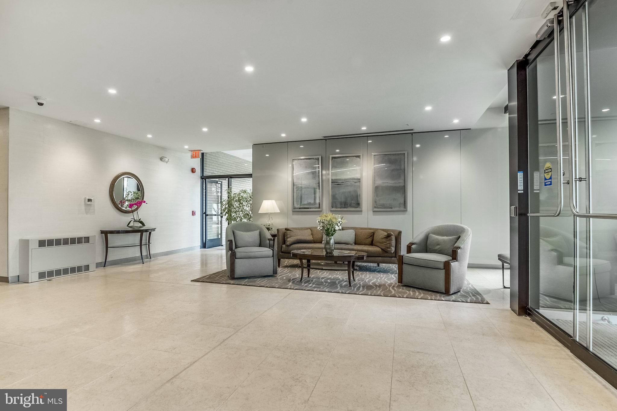 4141 North Henderson Road, Unit 1019 Arlington, VA 22203 - Photo 23 of 27 Inviting lobby with modern elegance.