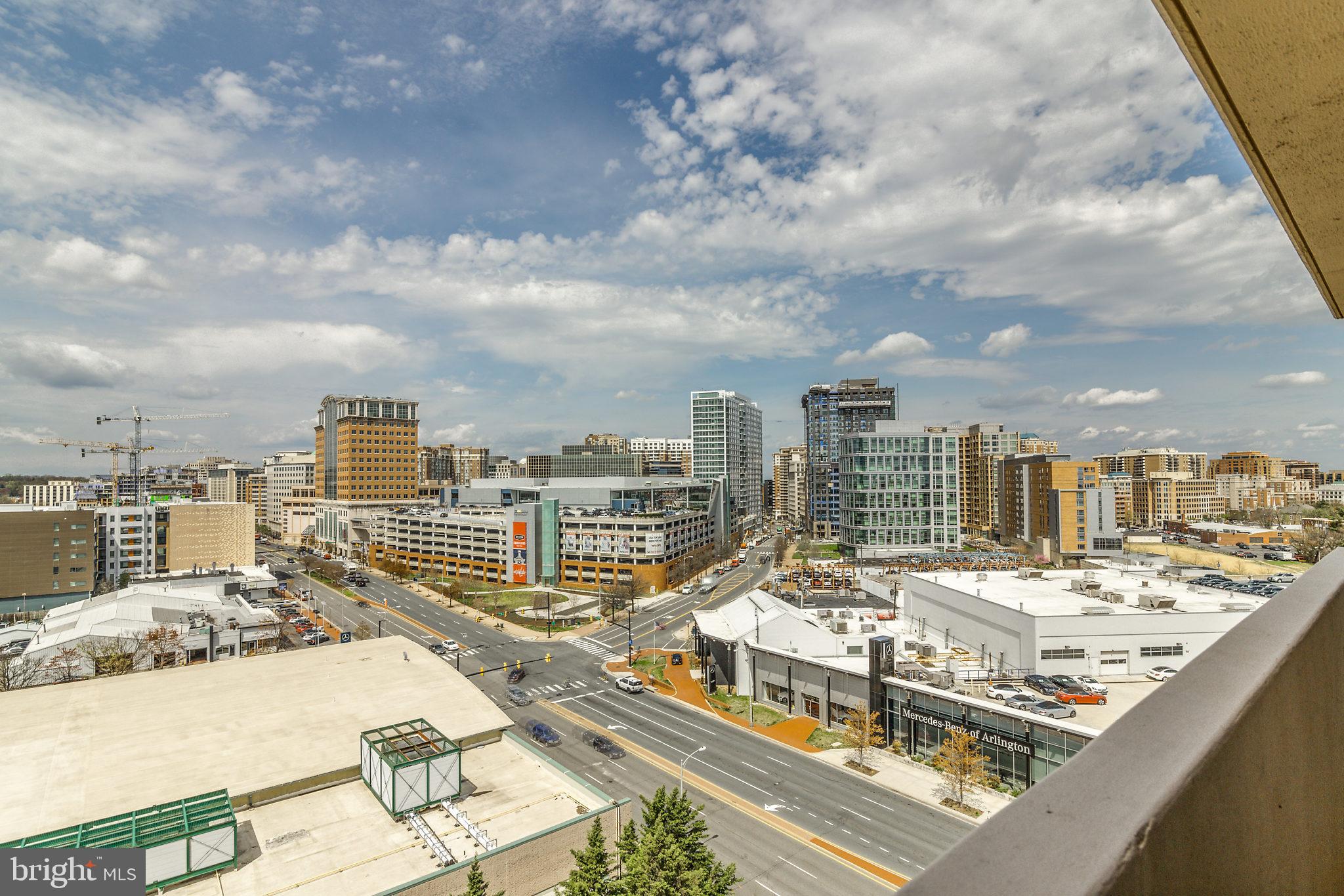 4141 North Henderson Road, Unit 1019 Arlington, VA 22203 - Photo 25 of 27 Urban skyline with vibrant city life.