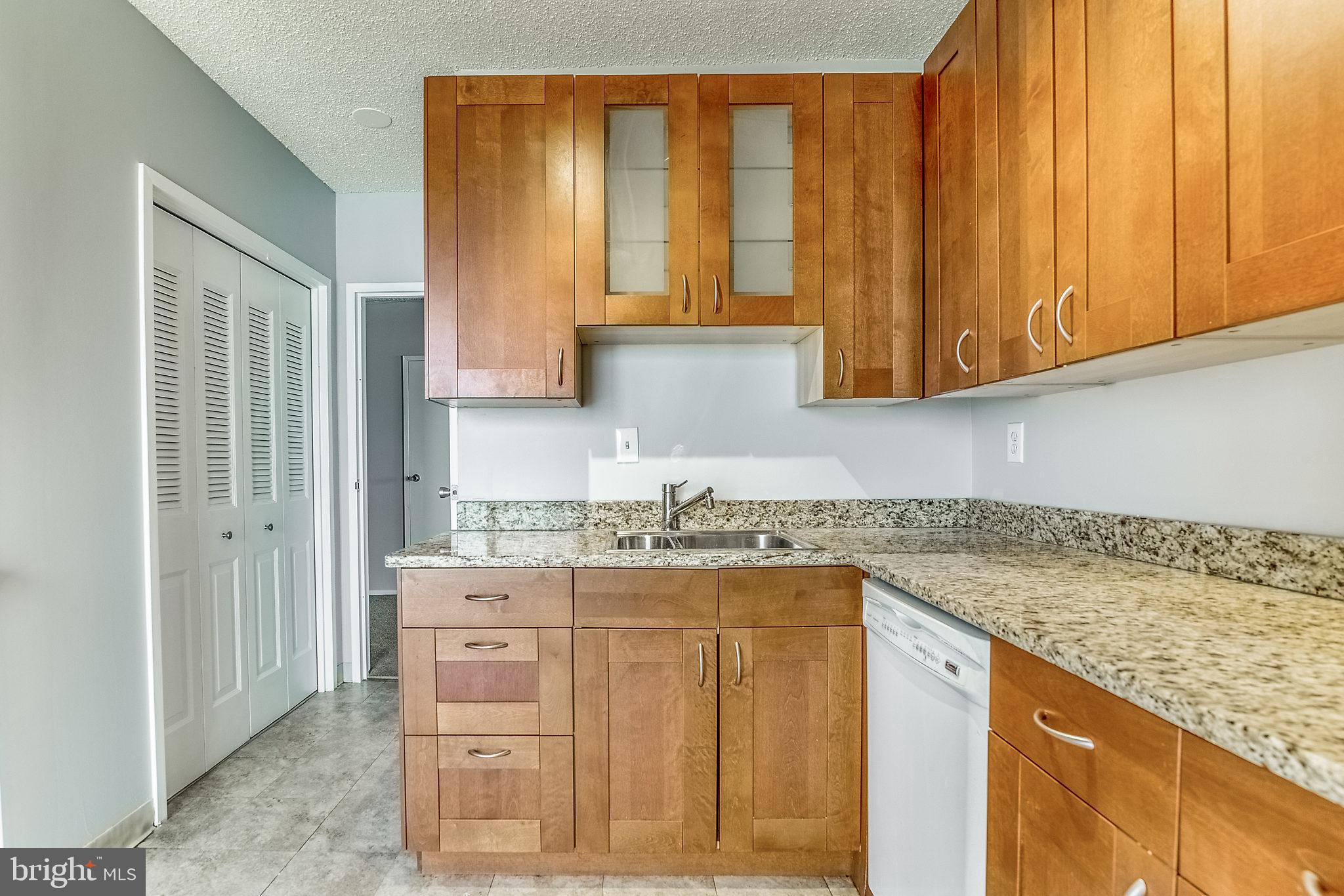 4141 North Henderson Road, Unit 1019 Arlington, VA 22203 - Photo 6 of 27 Modern kitchen with sleek cabinetry.