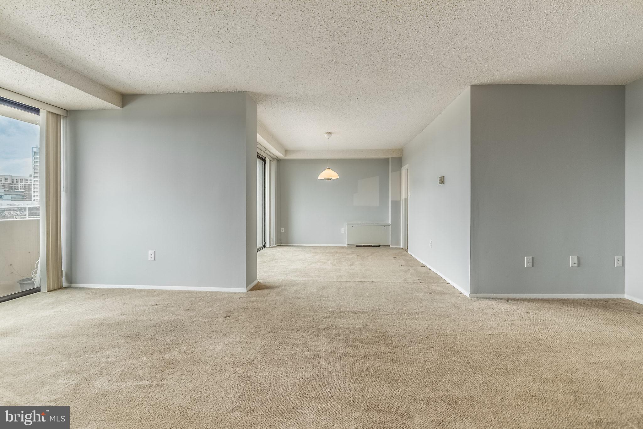 4141 North Henderson Road, Unit 1019 Arlington, VA 22203 - Photo 8 of 27 Spacious, light-filled living area awaits your ...