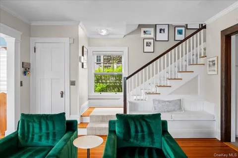 a spacious bedroom with a bed and a couch